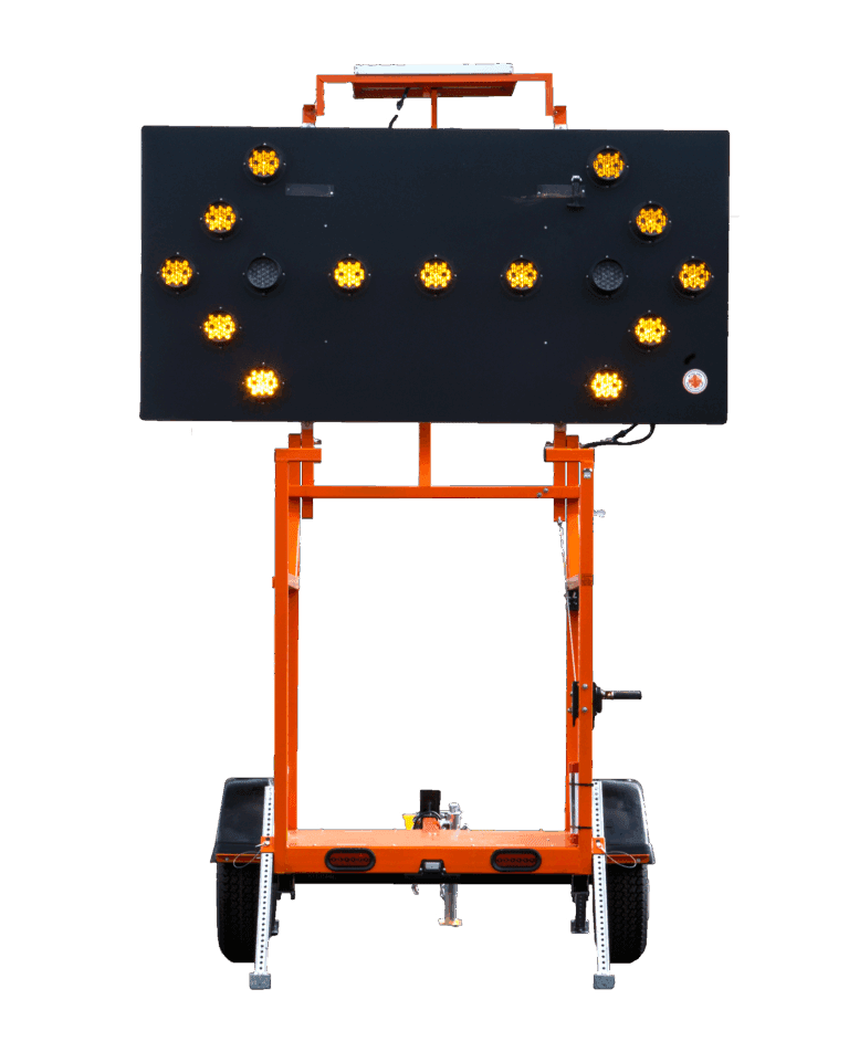 A portable electronic road sign on wheels displays multiple flashing yellow lights arranged in a left-pointing arrow pattern, indicating a lane closure or detour.