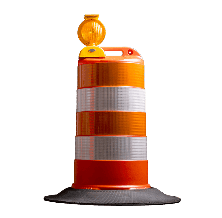 A large orange and white traffic barrel with reflective stripes and a yellow warning light on top stands on a black rubber base against a plain white background.
